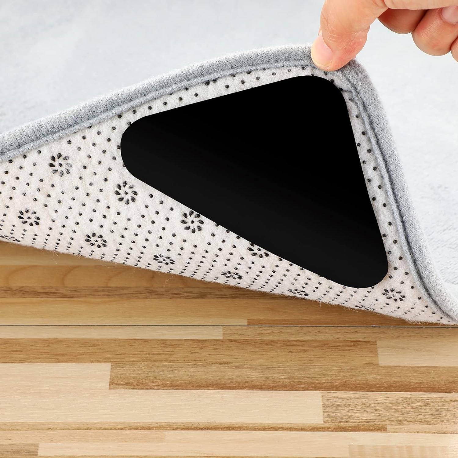 Non-Slip Rug Pad Grippers - Washable Anti-Curling Reusable Rug Stopper Tape and Corner Stickers for Hardwood, Tile, and Carpet Floors (12 Pieces)